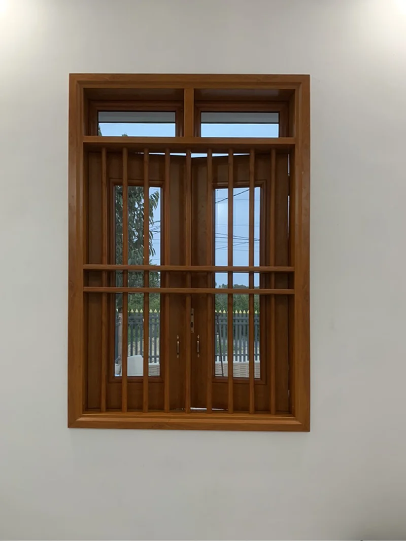 Mẫu song cửa bằng gỗ cho cửa thép vân gỗ 2 cánh